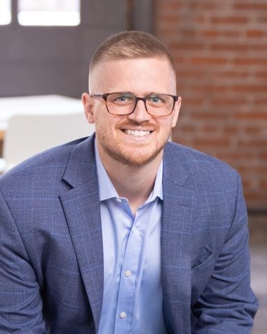 portrait of a smiling man in business attire